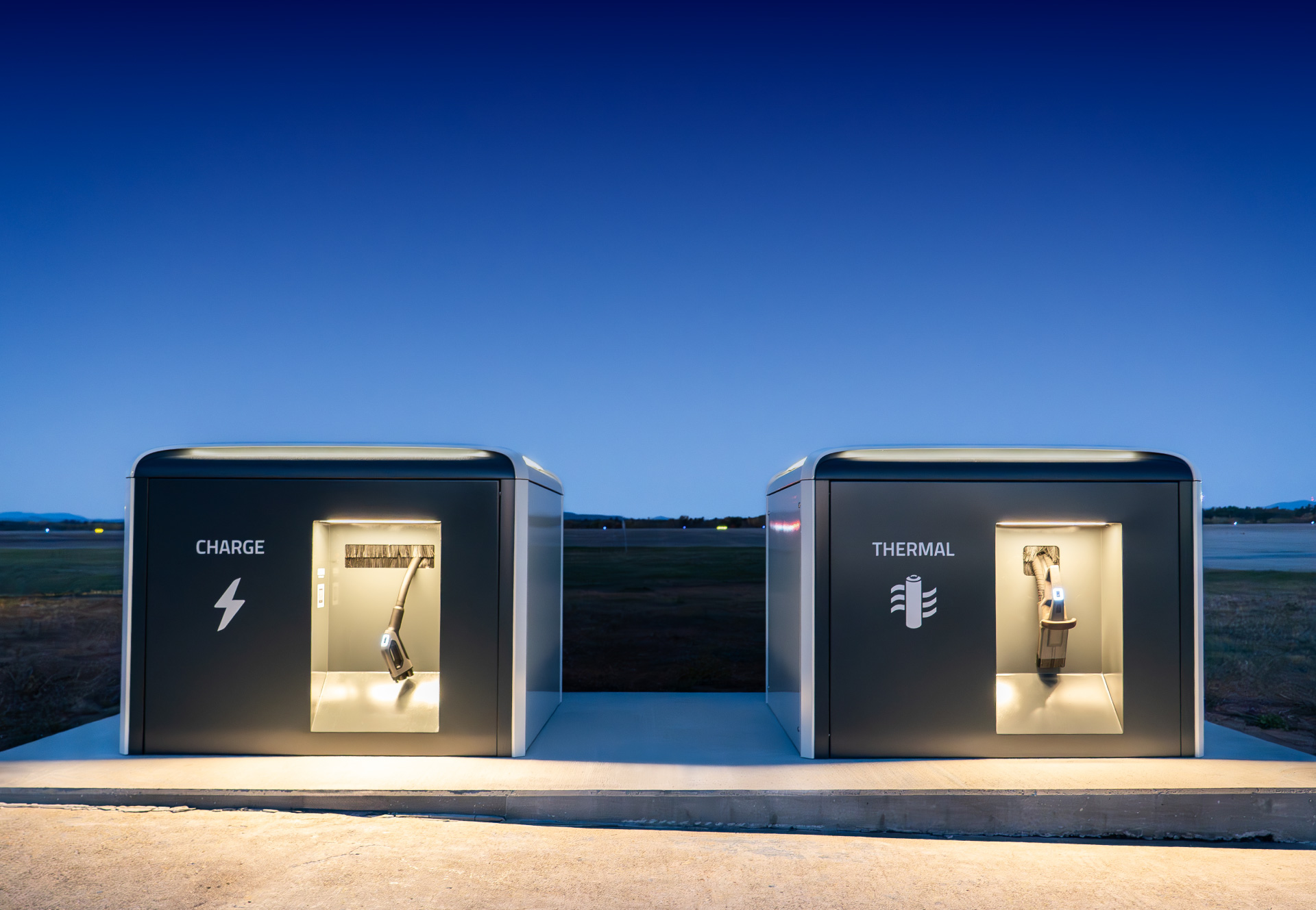 BETA Charge Cube and Thermal Management Cube lit up in the evening.