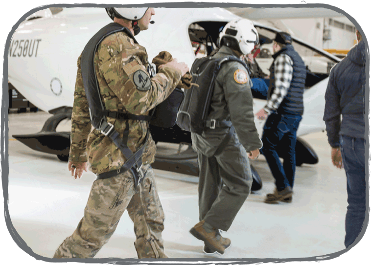 Members of the DOD walk towards ALIA