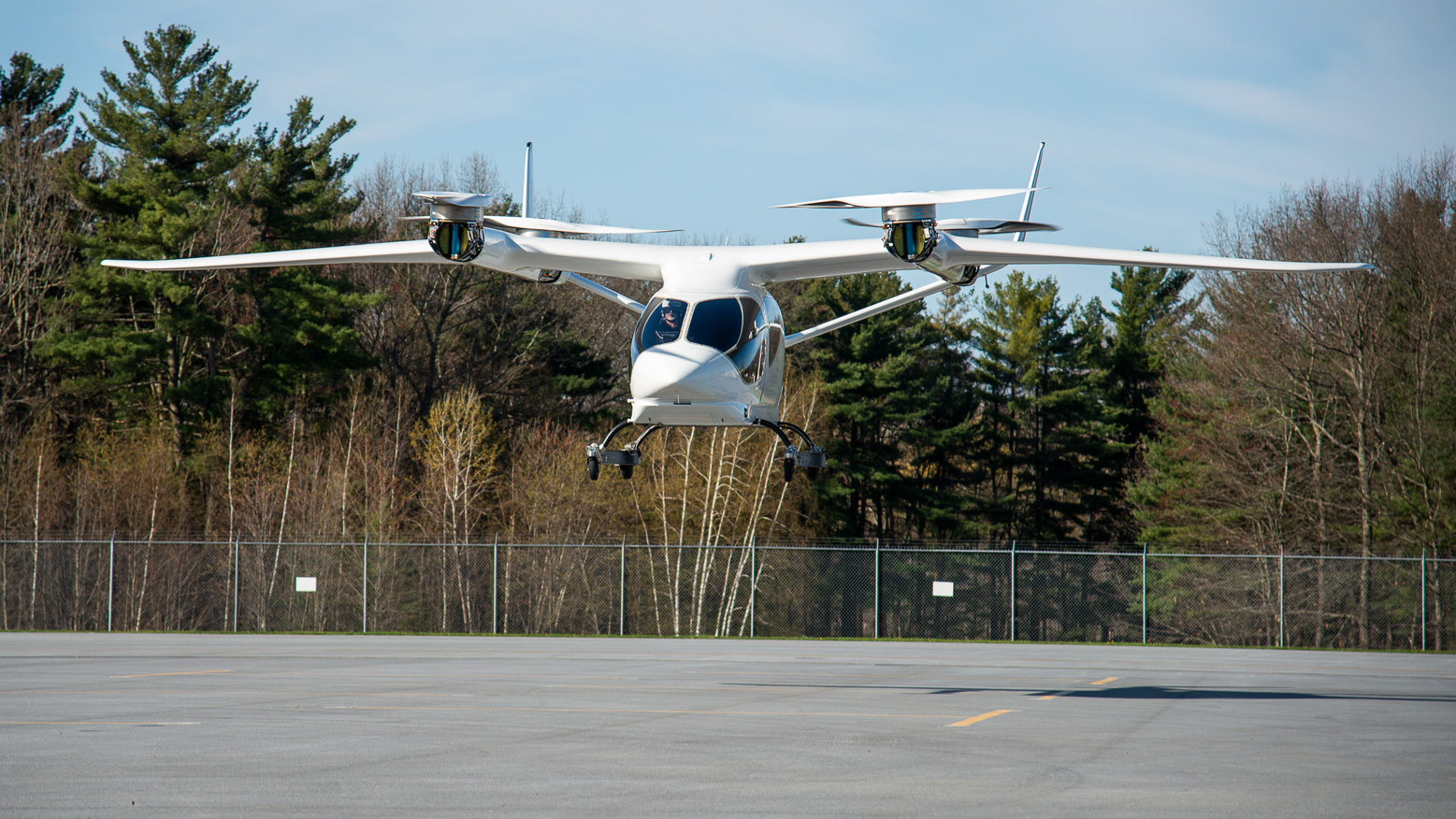 ALIA hovering over tarmac